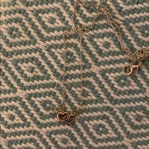 2 hearts interlocked gold and silver necklace